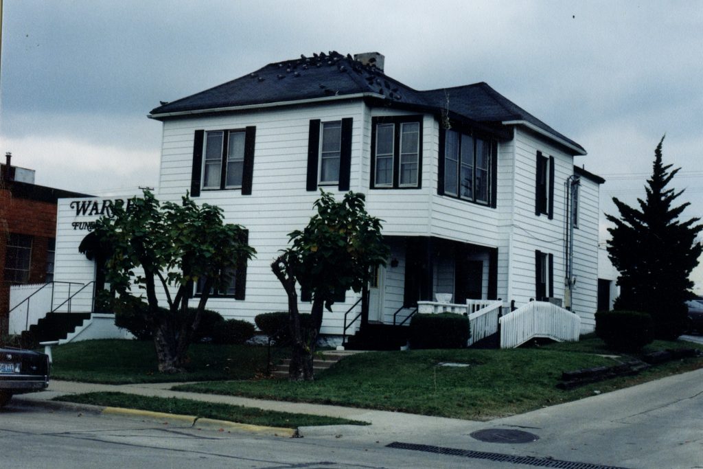 The home as Warren Funeral Chapel, before restoration